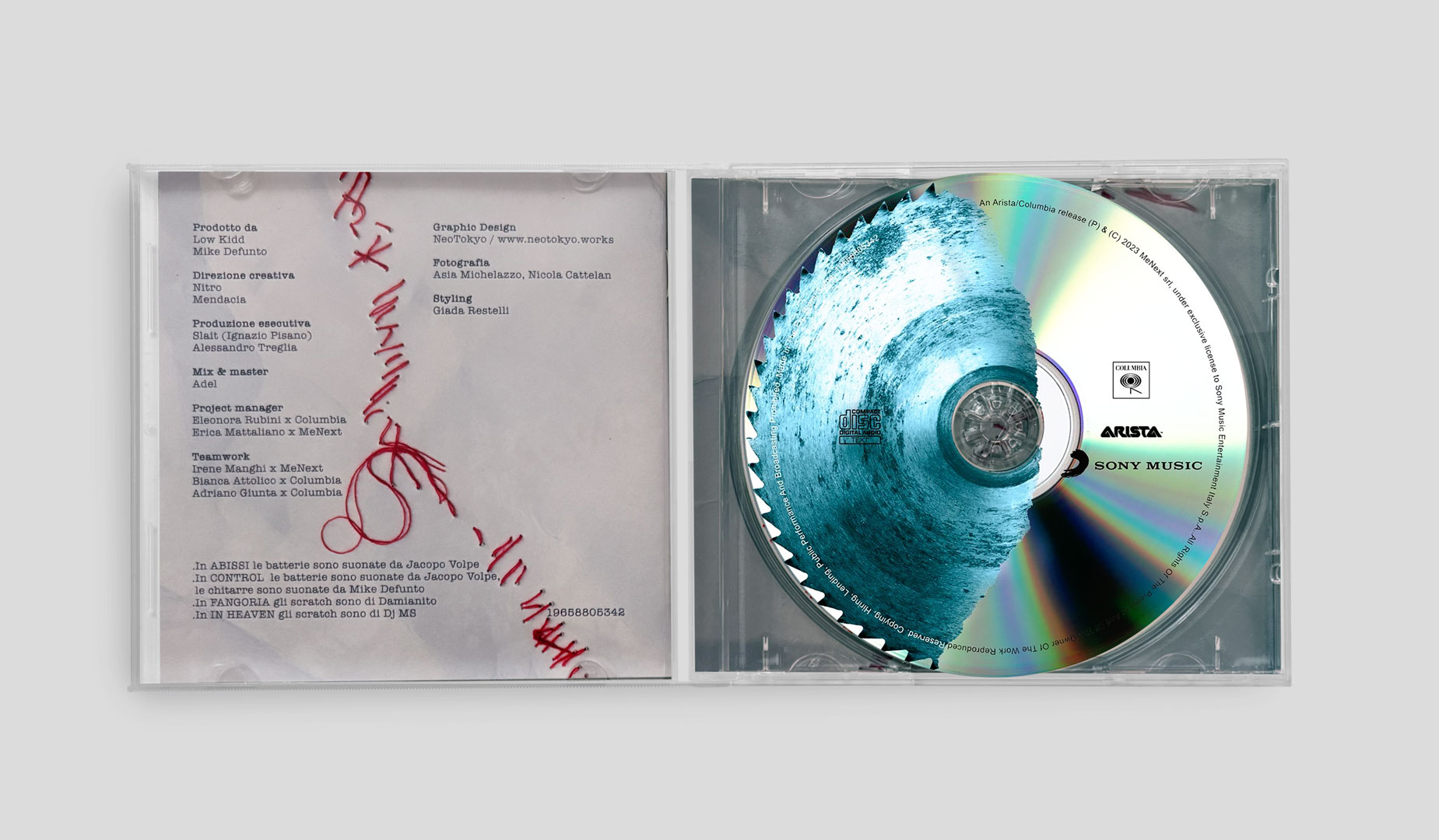 Outsider — CD aperto, booklet crediti e disco